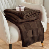 CozeCube check knit throw on sofa offering cozy warmth for the living room