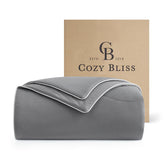 Cozy Bliss cooling comforter on queen bed for all-season comfort.