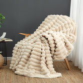 Cozy Bliss faux fur throw blanket on sofa for cozy evenings