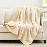 Cozy Bliss sherpa throw on couch adds plush warmth