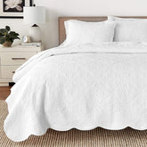Cozy Line oversized king quilt with embossed texture for full coverage.