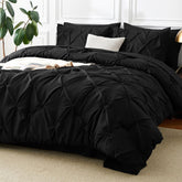 CozyLux full-size black pinch-pleat comforter set close-up showing refined texture.