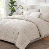 CozyLux queen beige comforter set shown on bed for all-season warmth and style.