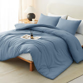 CozyLux queen comforter set in dusty blue packaging ensures fresh delivery.