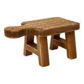 Creative Co-Op small wood pedestal with handle showcases a plant with rustic charm.