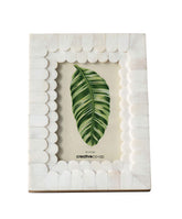 Creative Co-Op white scalloped bone and wood frame, front view, ideal for showcasing memories in 4x6 size