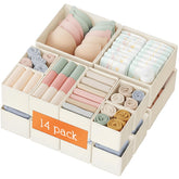 Criusia beige large drawer organizer bin in a dresser keeps baby clothes tidy and accessible.