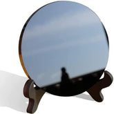 CRYSTALSTILE Black Obsidian Scrying Mirror with stand for focused divination sessions.