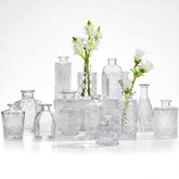 CUCUMI glass bud vase set with 12 pieces for elegant centerpieces.
