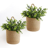Dahey wall basket with rope and eucalyptus adds rustic wall decor.