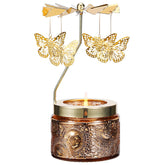 DAISRED butterfly-rotating candle holder adds whimsy to any room.