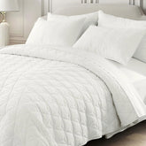 DAWNDIOR oversized king corduroy quilt with warm, textured surface for year-round comfort.