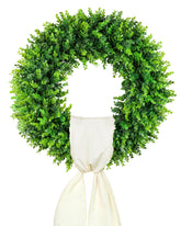 DDHS 20-inch boxwood wreath on front door with inviting look