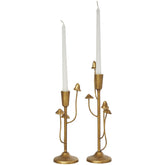 Deco 79 mushroom-inspired candle holder pair enhances a modern tabletop centerpiece
