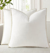 decorUhome Summer Chenille throw pillow cover in cream adds cozy farmhouse charm to a sofa.