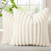 decorUhome cream white faux fur pillow cover with plush front on a living room sofa