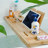 Deep Calm bathtub tray extends to fit large tubs for a seamless at-home spa.