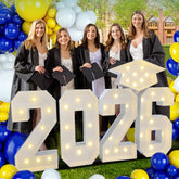 Deerher 2026 marquee numbers sign with cap and lights for festive outdoor grad parties.