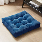 Degrees of Comfort navy square pillow, front view, inviting seating for family lounging.