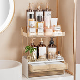 Delamu Amber 2-tier makeup organizer on vanity keeps skincare products within easy reach
