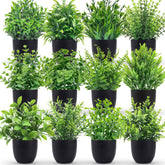 Der Rose fake plants in a black pot brighten desks with low-maintenance greenery.