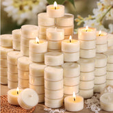 DEVI soy tea lights 6-hour burn close-up, clean ambiance for events.
