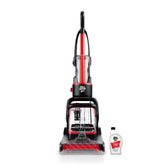 Dirt Devil full-size carpet cleaner with brush roll lifting tough stains.