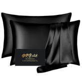 DKBslik silk pillowcase 2-pack in black protects hair and skin while you sleep.