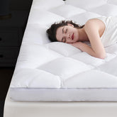 Downcool 3-inch queen topper with soft surface for cushioned comfort and support.