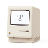 Dralaw Maclock 1984 PC design on ivory clock, perfect for retro desk setups.