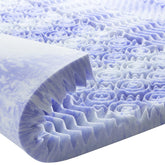 Dreamsmith queen topper close-up shows foam texture delivering cooling comfort.