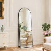 DUMOS 59x16 arched full-length mirror offers a true head-to-toe view for any room.