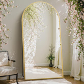 DUMOS arched full-length mirror on a stand in a bedroom for outfit checks