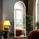 DUMOS arched LED mirror with stand for accurate outfit checks.