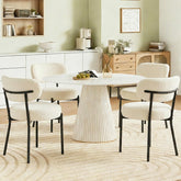 DUMOS dining chair set of four in boucle fabric for luxurious meals and seating