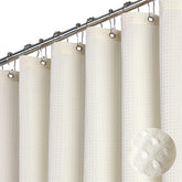 Dynamene cream ivory waffle weave shower curtain in 84-inch length for elegant privacy.