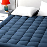 EASELAND full-size mattress pad with quilted top for plush comfort.