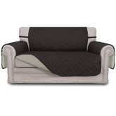 Easy-Going reversible loveseat cover in chocolate-beige protects fabric from spills and wear.