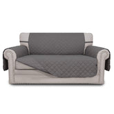 Easy-Going reversible loveseat cover with quilted fabric detail protects furniture from spills