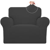Easy-Going Stretch Chair Slipcover in soft jacquard fabric for cozy family seating.