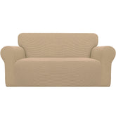 Easy-Going Stretch Loveseat Slipcover sand front view with snug fit.