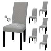 Easy-Going waterproof parson chair slipcover in light gray protecting dining chairs from spills