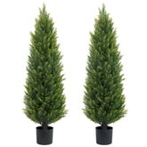 ECOLVANT two 4ft topiary on the front porch add evergreen charm.