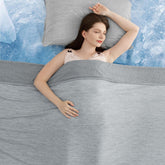 Elegear revolutionary cooling blanket king on bed shows instant cool touch.