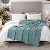 EMME cotton muslin blanket king size teal folded shows soft breathable texture