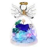 Encavy blue rose in a glass angel figurine, a timeless keepsake gift.