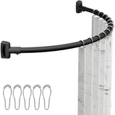 ENJOYBASICS curved shower rod installed in matte black for spacious feel