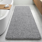 Enqinar bathroom runner rug 24x60 with soft absorbent fibers for plush post-shower comfort.