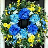 Eqanro 26-inch silk hydrangea wreath with yellow daisies and eucalyptus enhances front door curb appeal.