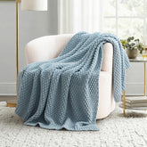 EVERGRACEHOME chunky chenille knit throw on sofa shows plush texture and cozy warmth.